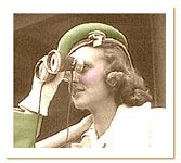 Woman looking through binoculars