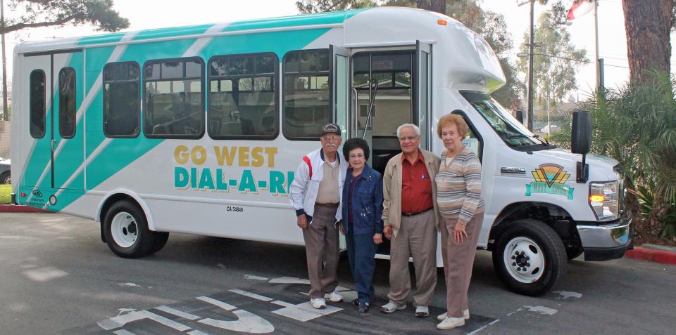 Seniors Posing by Go West Shuttle